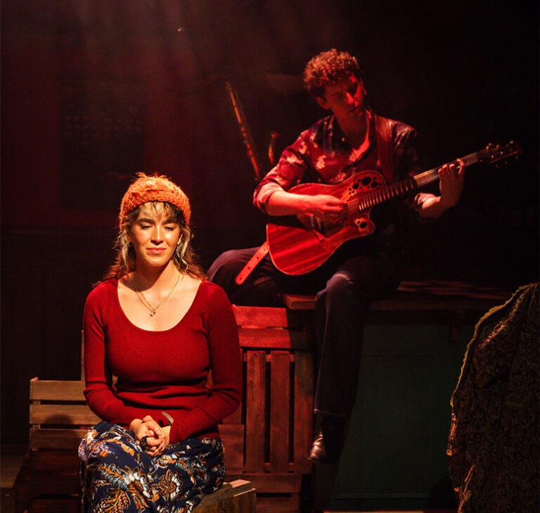 An intimate acoustic scene from Once, capturing the story of a guy who gave up on music and the girl who inspired him again.